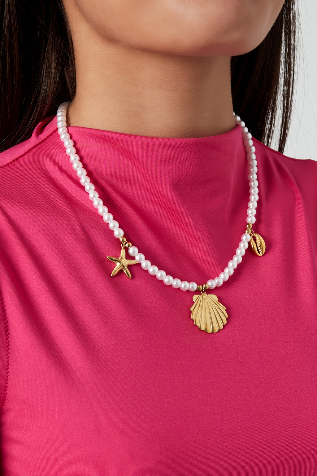 Collar de perlas con dijes de mar
