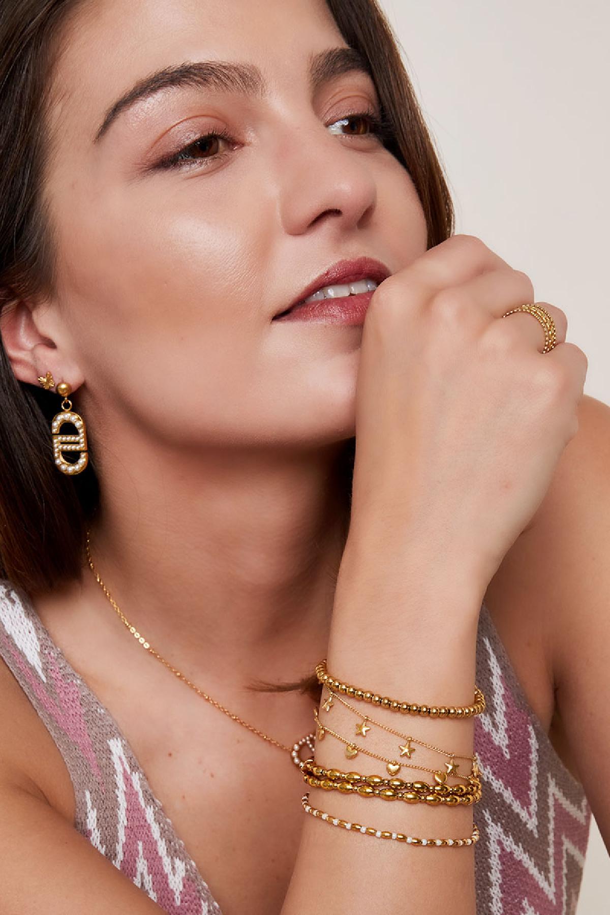 Pulsera con dijes de corazón