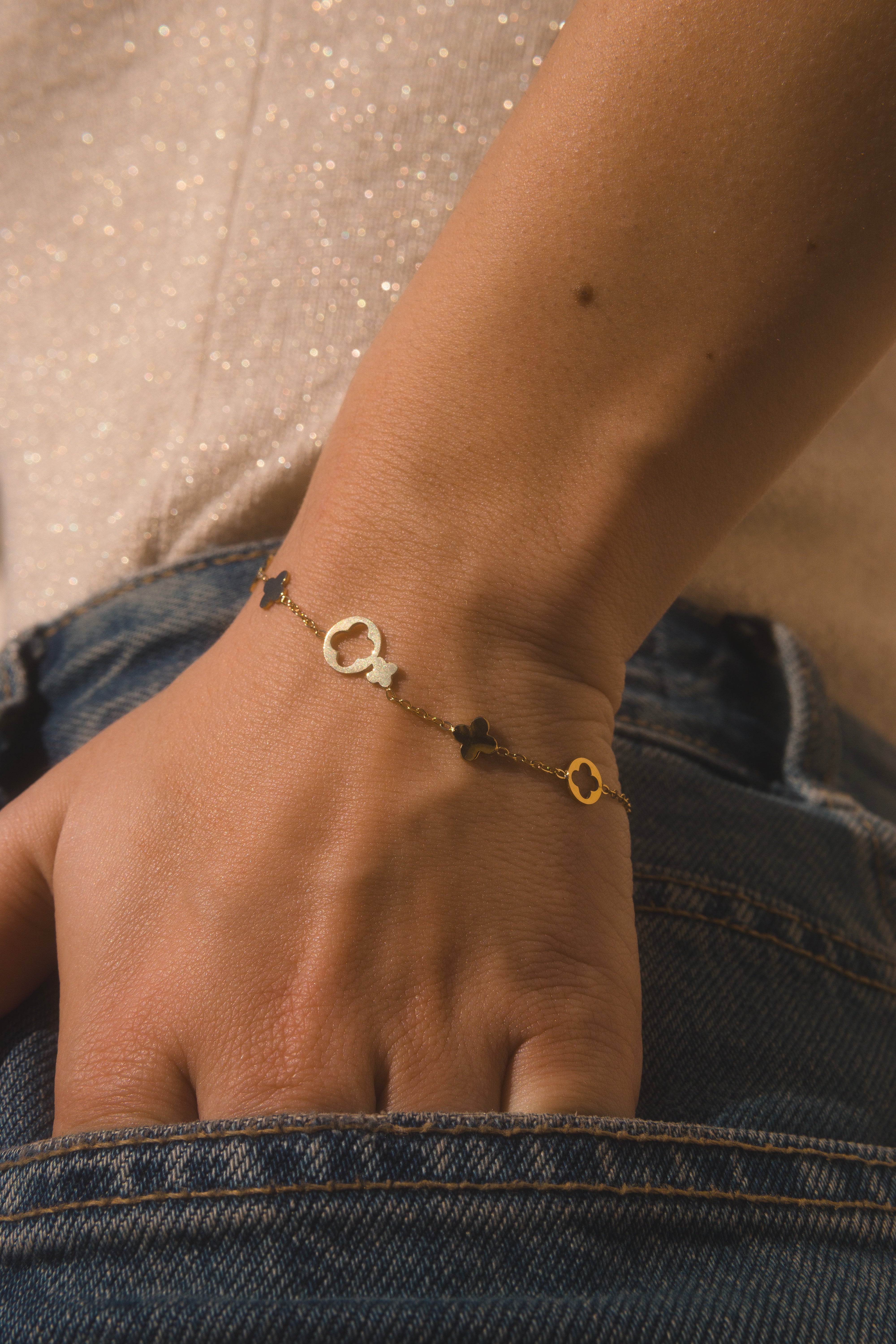 Pulsera con dijes tréboles