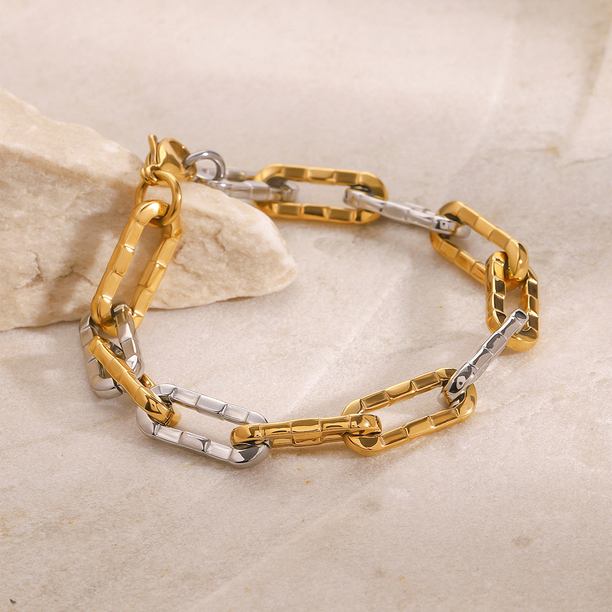 Pulsera eslabones entrelazada bicolor