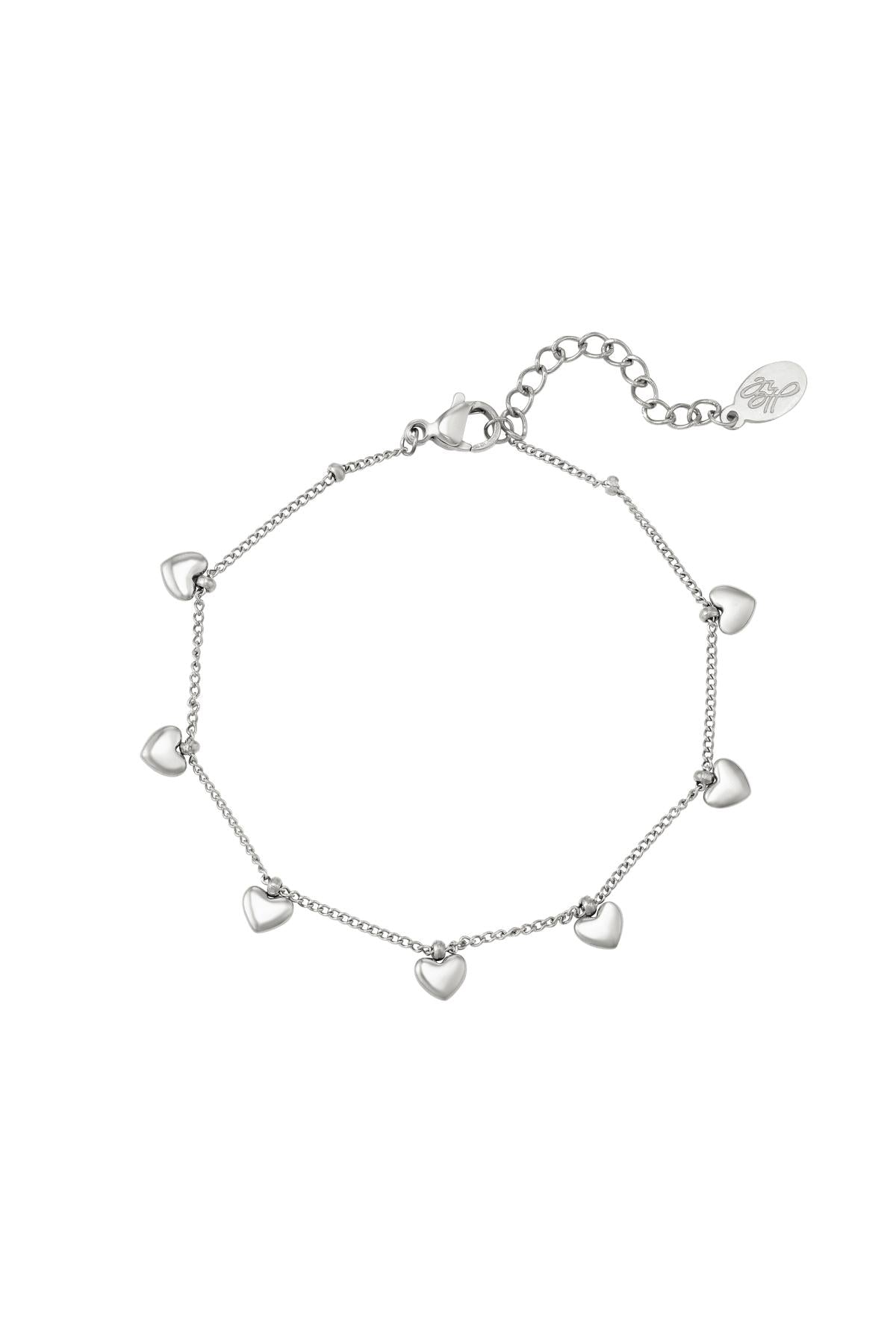 Pulsera con dijes de corazón