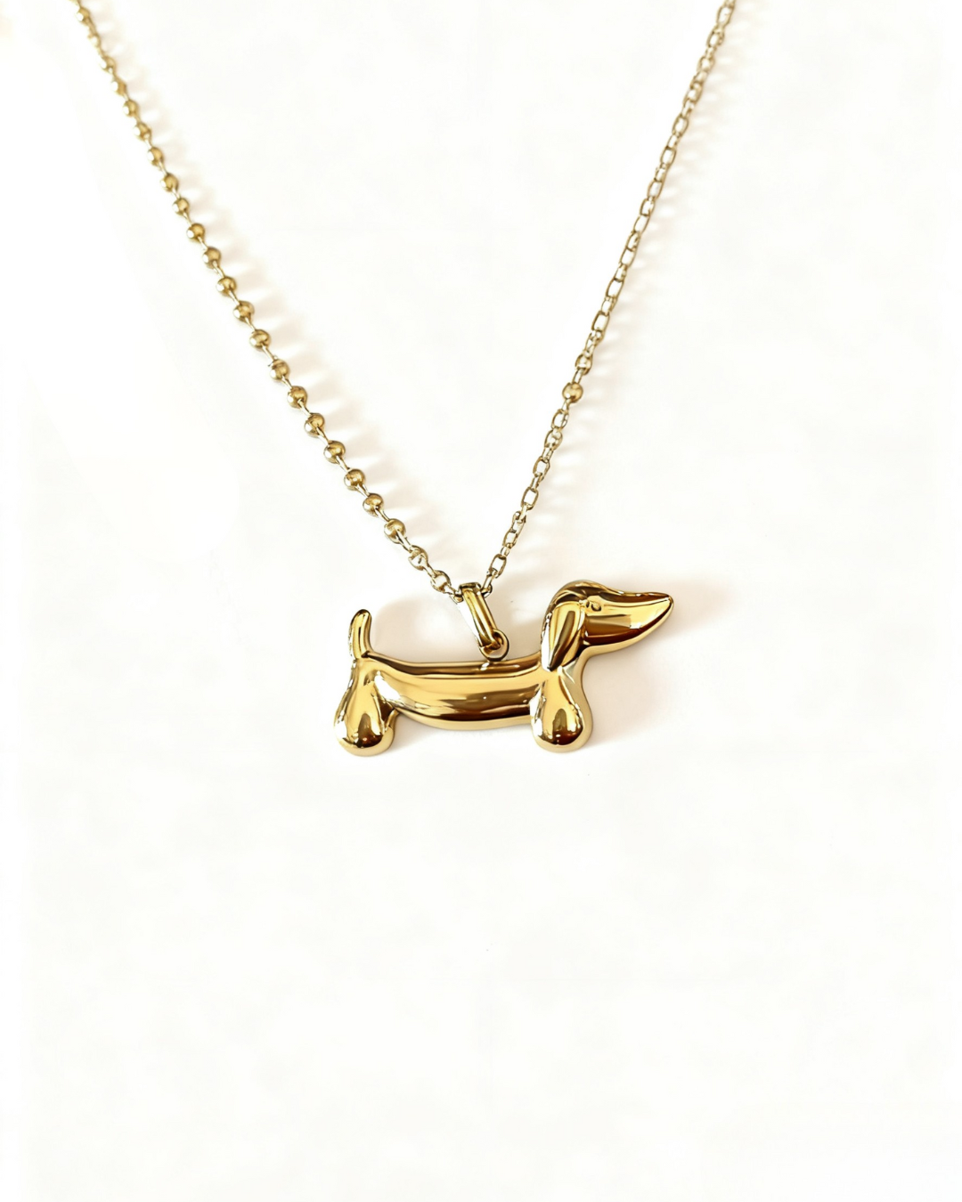 Collar Perrito Salchicha Dorado