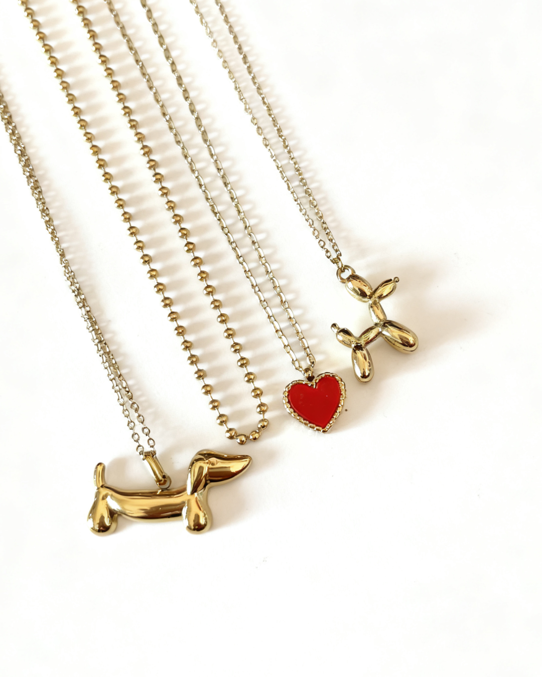 Collar Perrito Salchicha Dorado