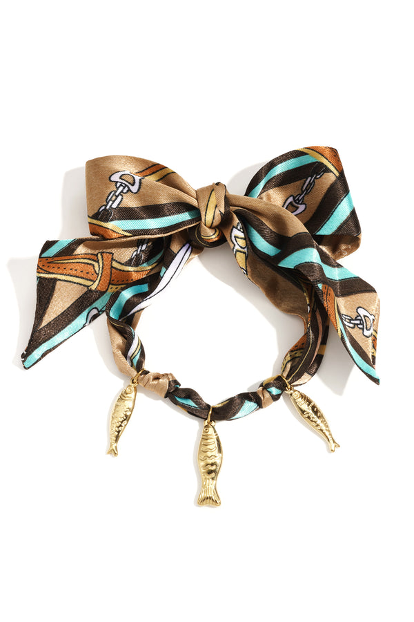 Pulseras  con dijes de pez